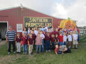 Student and family gather for a photo.